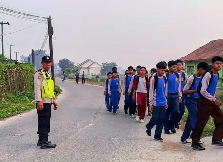 Sapa Pagi Wujudkan Pelayanan Prima Dan Polri Yang Humanis Menciptakan Kelancaran Jalan Raya Pakisjaya