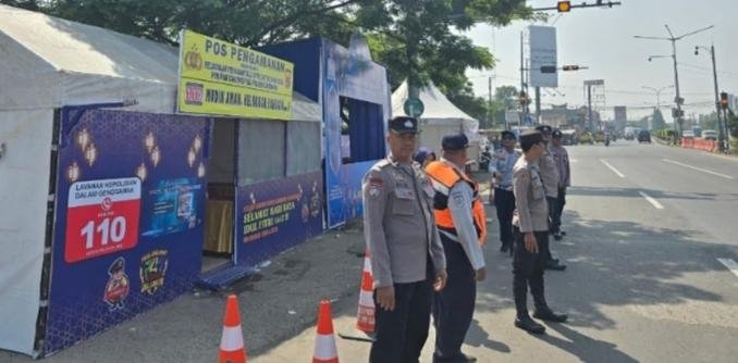 Antisipasi Kepadatan Arus Mudik, Polres Karawang Siagakan Personel di Pos Pam Tanjung Pura