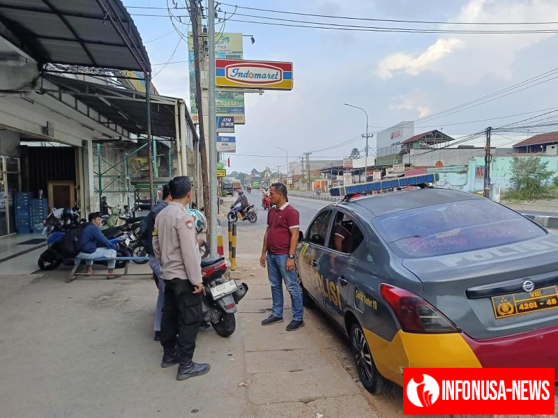 Patroli Polsek Kotabaru Himbau Kepada Juru Parkir Minimarket Jaga Kamtibmas