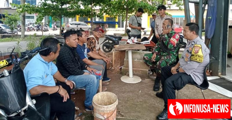 Bhabinkamtibmas Polsek Telukjambe Timur Bersama Babinsa Giat Sambang ke Pos Security Perumahan