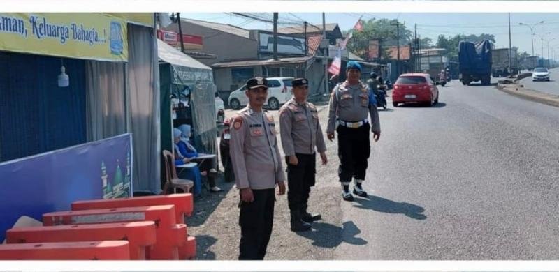 Anggota Pos Pam Melaksanakan Pengamanan Arus Lalu Lintas Dalam Rangka Ketupat Lodaya 2026