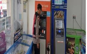 Personil Polsek Tegalwaru Patroli Siang Monitor Sarana Perbankan ATM di Minimarket Loji