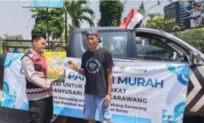 Bripka Satim Anggota Polsek Banyusari Kembali Sediakan Beras SPHP Murah Untuk Masyarakat