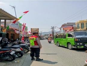 Personil Polsek Tegalwaru Gelar Patroli Siang Monitoring Parkir Motor di Pasar Loji Cintalaksana Cegah C3
