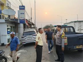 Patroli Polsek Kotabaru Sambang Obyek Vital Perbankan Sampaikan Pesan Kamtibmas