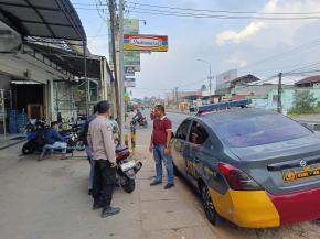 Patroli Polsek Kotabaru Himbau Kepada Juru Parkir Minimarket Jaga Kamtibmas