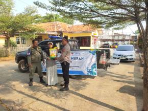 Dalam Rangka Upaya Gerakan Pasar Murah Polsek Purwasari Polres Karawang Jual Beras Murah